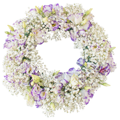 A serene, circular funeral wreath dominates the image, positioned against a bright white background that highlights every floral detail. The outer ring is completely filled with sprays of white baby's breath, the countless tiny blossoms packed together to create a soft, cloud-like cushion. This Gypsophila base has a gentle, airy feel, much like mist along the river near Grove Park on a still morning. Resting within this cloud are elegant lisianthus blooms, their petals finely ruffled and slightly cupped, adding graceful depth and movement. The lisianthus are primarily white, but their edges are carefully traced with varying shades of lilac, lavender, and rich purple, sometimes forming a neat outline, sometimes bleeding softly into the petals in a dreamy, watercolour effect. A mixture of fully open blooms and smaller, pale green buds gives the wreath a sense of natural rhythm, as though some flowers are just beginning their moment while others are in full expression. The centre of the wreath remains open and uncluttered, reinforcing the symbolism of a never-ending circle. There is a complete absence of foliage or bold accent colours, focusing the eye on the interplay between pure white and gentle purple tones. The even, neutral lighting captures the softness of the petals and the delicate grain of each tiny flower, conveying a feeling of quiet dignity. This is the kind of carefully balanced design a family might order from Grove Park Florist for a funeral, memorial service, or a peaceful graveside tribute, when they wish their flowers to speak of love, respect, and tranquil farewell.