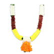 A U-shaped ceremonial garland photographed against a pure white studio backdrop, rendered in vivid, festival-ready colours and plush artificial textures. From the top of each short upright arm, dense clusters of creamy-white pom-pom florets gather like soft chrysanthemums, their rounded surfaces catching the light and suggesting a delicate silk or high-quality polyester fabric. Below those pale sections a band of deep reddish-brown follows, each element layered and slightly flattened to imitate dried petals or terracotta-toned leaves, adding a warm, grounding contrast to the composition. The curved arms sweep down into a broad, cheerful band of bright golden-yellow clusters that read unmistakably as marigold-inspired - fluffy, tightly threaded and full-bodied, the kind of colour and texture that announces celebration. Small stitches of vivid green appear at the junctions, hinting at leafy ribbon or calyx accents that break the colour blocks with crispness. At the very centre where the two arms meet, a generous, multi-layered pendant of intense orange ruffles hangs as the focal point, a voluminous tassel-like bloom that draws the eye and completes the U with a joyful punctuation. The lighting emphasises the layers and softness of each segment, and though the garland is artificial it conveys a tactile sense of weight and resilience suited to repeated use in puja, doorway torans, Diwali displays or wedding decor. A floral piece like this, often chosen across local homes and community halls near Grove Park station and the nearby nature reserve, balances tradition and durability with a bright, welcoming presence.