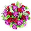 In this overhead photograph, the bouquet forms a rich, rounded cluster of flowers and foliage, floating against a spotless white background that emphasises every colour and texture. The main impression is of fullness and symmetry, as though each bloom has been carefully angled by a skilled Grove Park florist to create a balanced, harmonious whole. Deep red roses dominate the composition, their layered petals opening into generous, velvety cups that spiral towards the center in elegant curves. The crimson shade is intense and romantic, making the roses feel like the emotional heart of the arrangement. Intertwined with them are abundant purple carnations, whose frilled, fluttering petals add softness and a sense of playful movement. Their colour runs from royal purple to slightly pinkish tones, providing a striking counterpoint to the solid red of the roses. The surrounding greenery brings depth and contrast: broad, glossy leaves in a vibrant dark green form the structural base, while smaller, rounded eucalyptus leaves in a muted, silvery-green tone create gentle highlights and a contemporary twist. The overall effect is one of polished opulence, enhanced by the clean backdrop that could easily be the work surface of a Grove Park florist studio near the tree-lined avenues leading towards Kew Bridge or the quiet paths by the River Thames. This bouquet feels ideal for special occasions where emotion runs high-anniversaries, milestone birthdays, or significant thank-you gestures-yet it retains an approachable warmth. It looks and feels like a bouquet chosen with care for someone special in the local community, combining classic red roses and vibrant purple carnations in a visually striking, beautifully textured design.